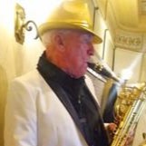 Circular photo of Greg Gorman